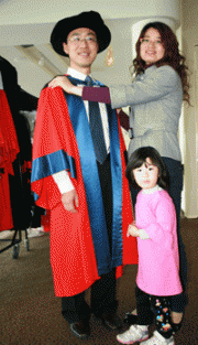 Yanan Hao receives PhD accompanied by wife Lina and daughter Lily Yanan Hao receives PhD accompanied by wife Lina and daughter Lily