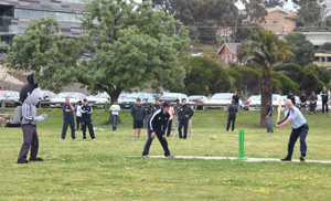 Commissioner Overland batting with George in the field Commissioner Overland batting with George in the field