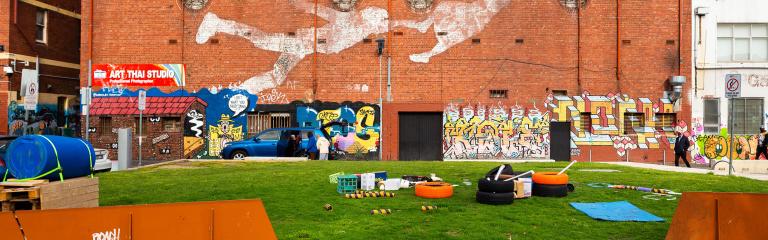 Baby Guerrilla street art on the side of a building in Footscray.