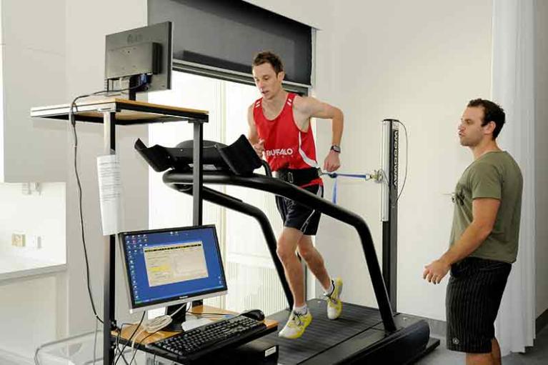 Exercise science with treadmill in sport laboratory
