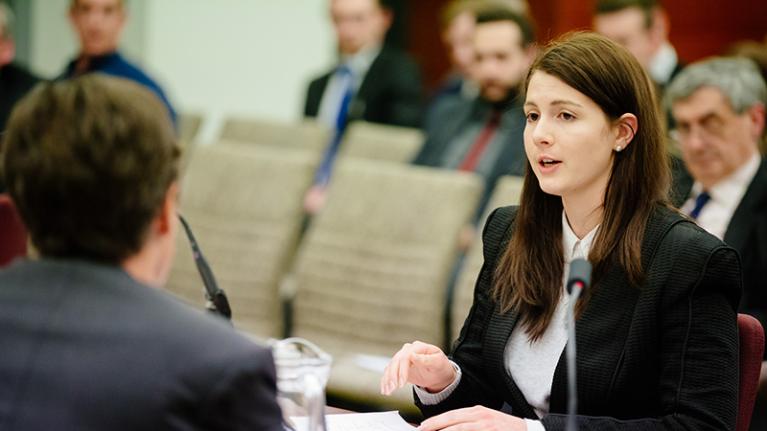 Female legal student taking part in practice legal procedings