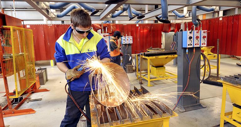 welding student in a workshop