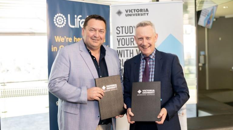  Lifeline General Manager Jason Doherty with VU Vice-Chancellor Adam Shoemaker