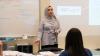  Photo of a program participant presenting to a group