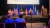 Panel of women on stage
