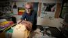  Professor Gary Foley surrounded by objects from Aboriginal History Archive