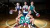  girls in gym playing basketball