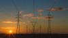 sunset behind powerlines