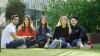  Students sitting on grass