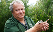 Greg Gordon with rescued lizard Greg Gordon with rescued lizard